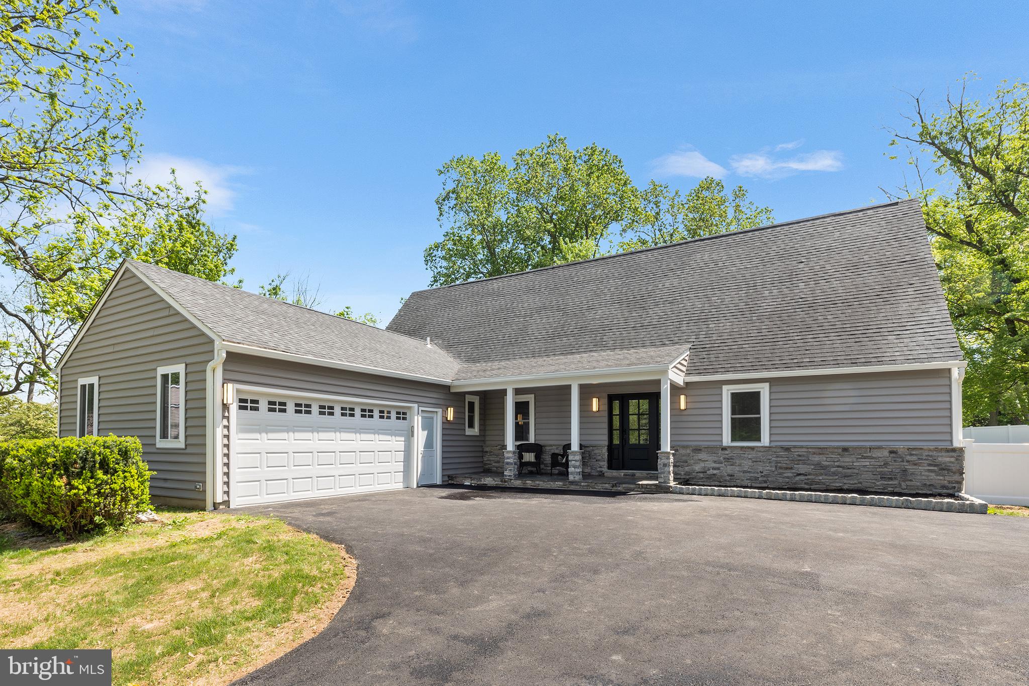 849 Glenn Circle Wayne, PA 19087 - Photo 13 of 36 front view of a house with a yard