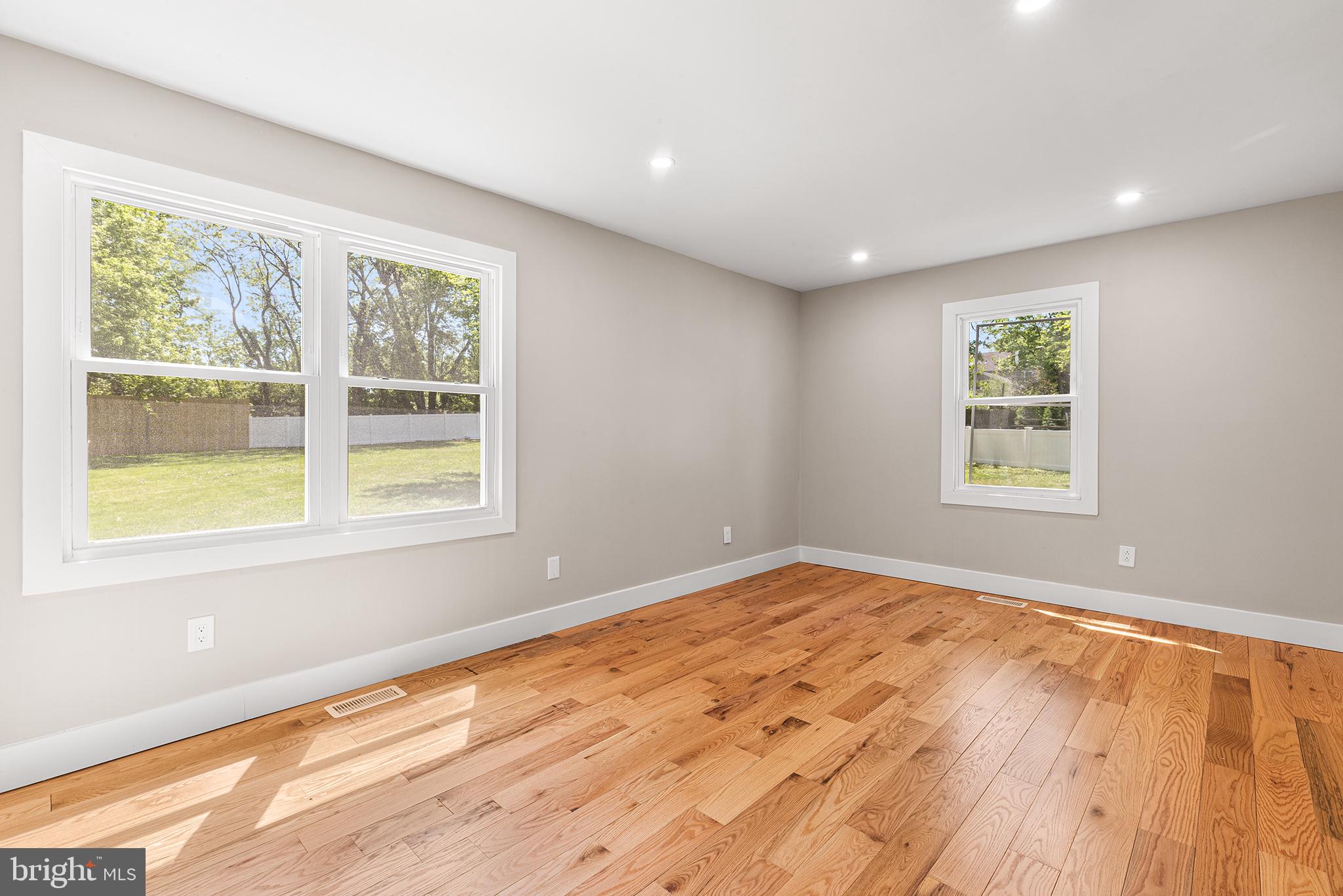 849 Glenn Circle Wayne, PA 19087 - Photo 18 of 36 a view of empty room with wooden floor and fan
