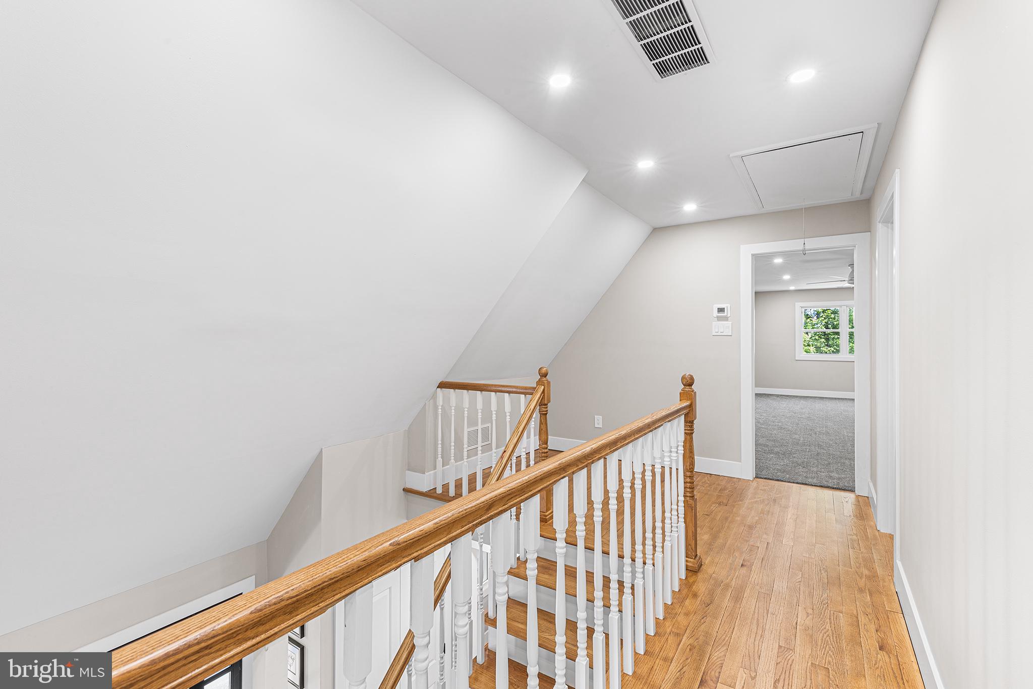 849 Glenn Circle Wayne, PA 19087 - Photo 21 of 36 a view of a hallway with wooden floor