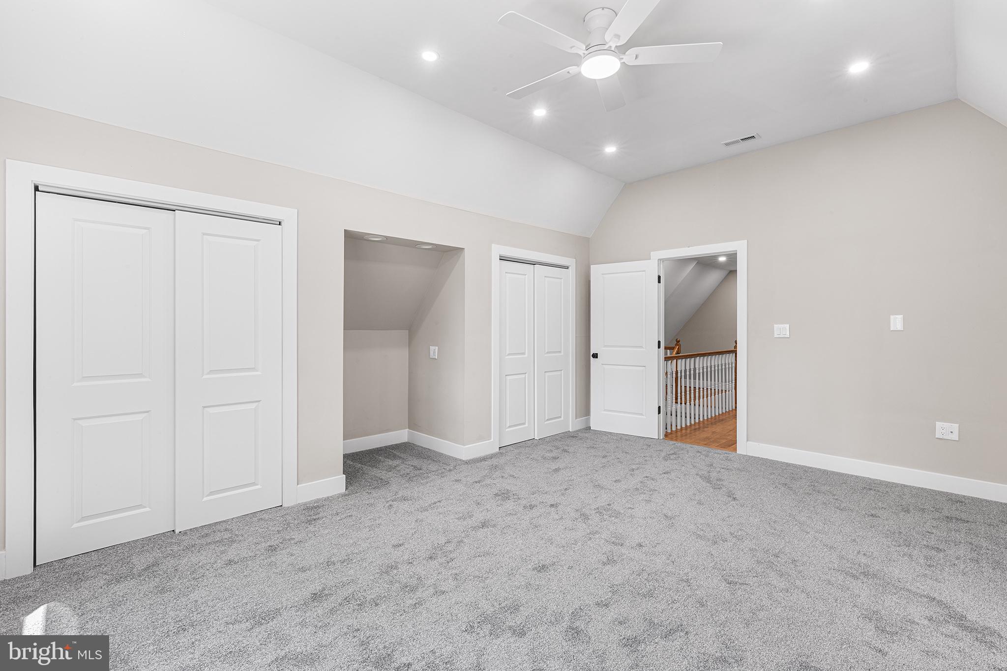849 Glenn Circle Wayne, PA 19087 - Photo 23 of 36 an empty room with closet and a ceiling fan