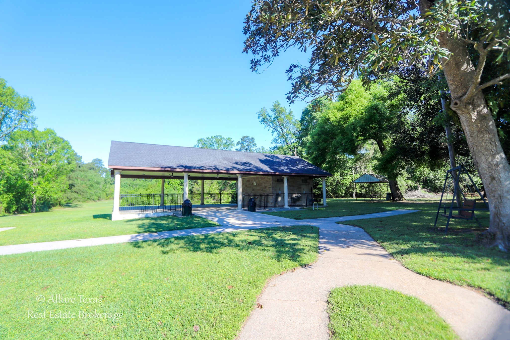 2208 Appian Way New Caney, TX 77357 - Photo 10 of 14 a house view with a garden space