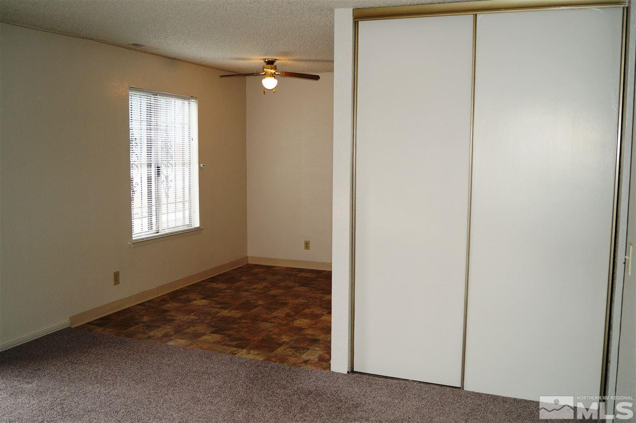 4608 Neil Road, Unit 275 Reno, NV 89502 - Photo 8 of 13 a view of an empty room with window