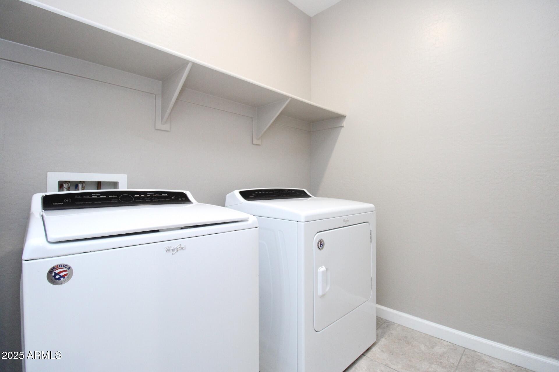 1255 North Arizona Avenue, Unit 1269 Chandler, AZ 85225 - Photo 17 of 29 a utility room with dryer and washer