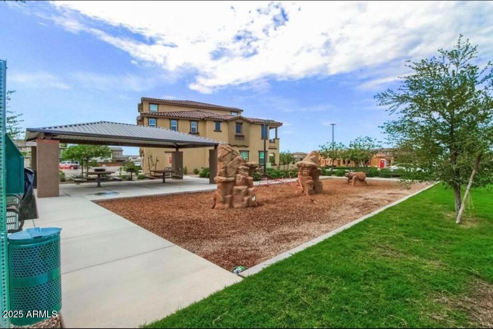 1255 North Arizona Avenue, Unit 1269 Chandler, AZ 85225 - Photo 24 of 29 a view of a park with swings and slides