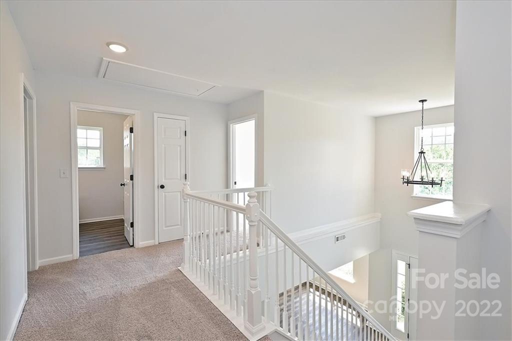675 Winding Branch Road Rock Hill, SC 29732 - Photo 18 of 34 a view of a hallway with a window and stairs
