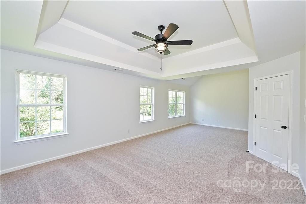 675 Winding Branch Road Rock Hill, SC 29732 - Photo 19 of 34 a view of a livingroom with a window and a ceiling fan