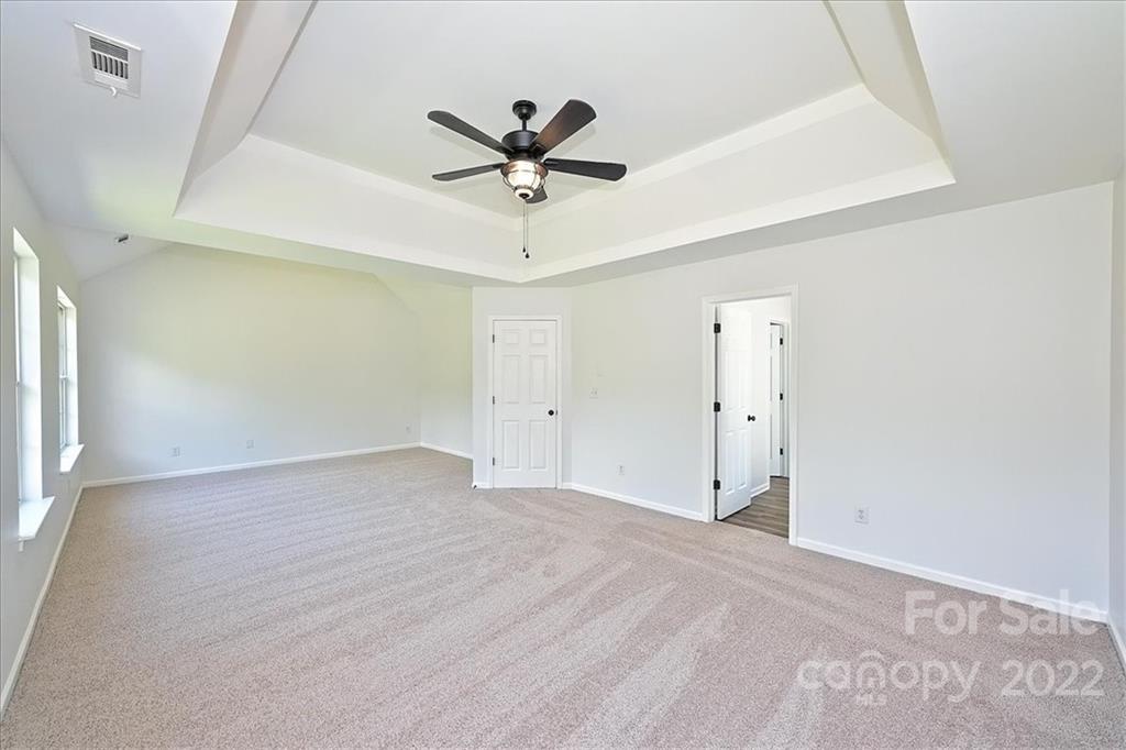 675 Winding Branch Road Rock Hill, SC 29732 - Photo 20 of 34 a view of a livingroom with a ceiling fan & window