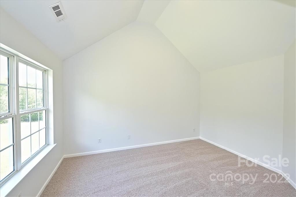 675 Winding Branch Road Rock Hill, SC 29732 - Photo 21 of 34 wooden floor in an empty room with a window