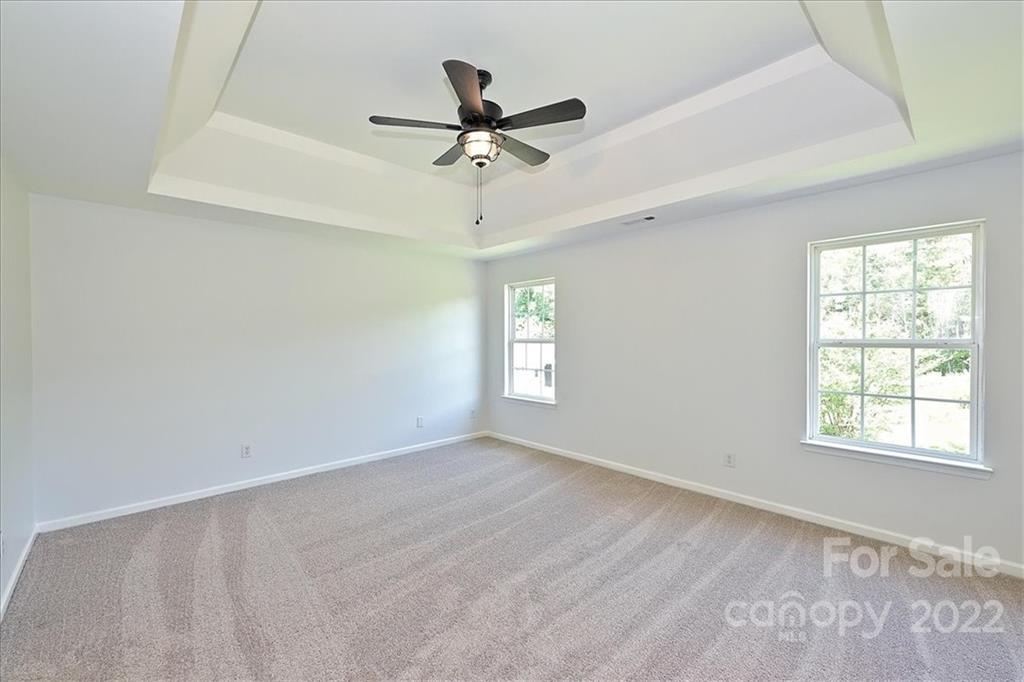 675 Winding Branch Road Rock Hill, SC 29732 - Photo 23 of 34 wooden floor in an empty room with a window