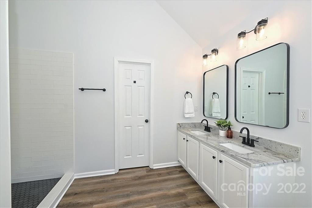 675 Winding Branch Road Rock Hill, SC 29732 - Photo 26 of 34 a bathroom with double vanity sinks and a mirror