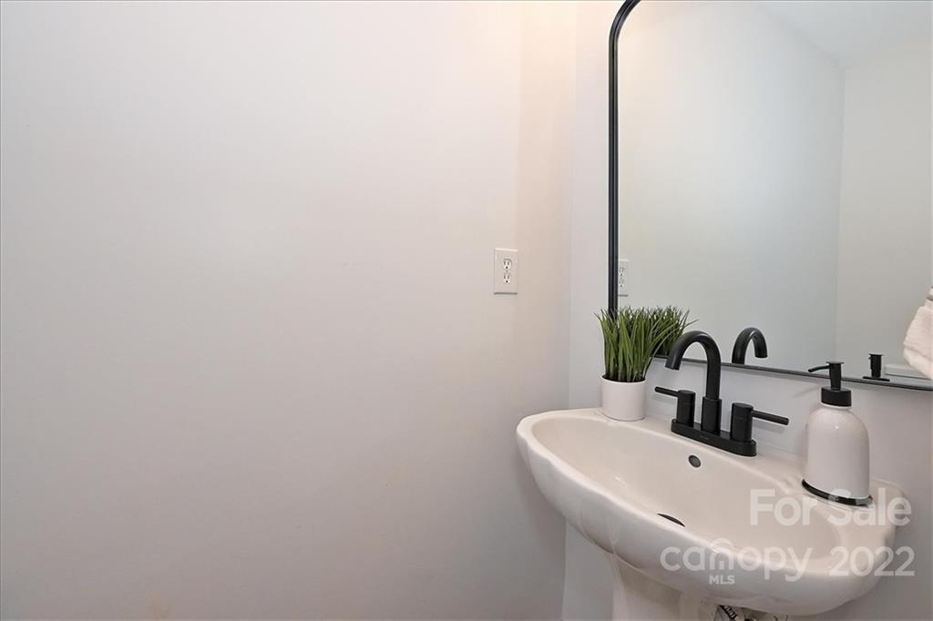 675 Winding Branch Road Rock Hill, SC 29732 - Photo 7 of 34 a bathroom with a sink and a mirror