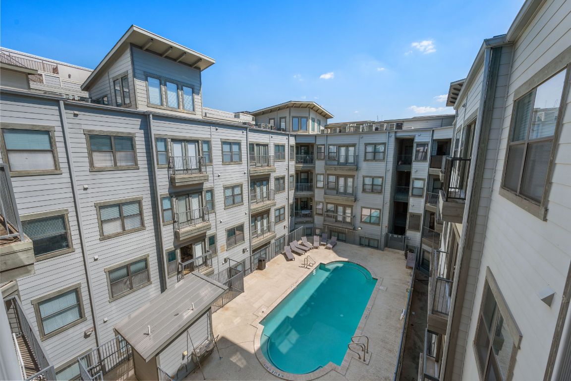 2502 Leon Street, Unit 511 Austin, TX 78705 - Photo 21 of 27 a front view of a house with a yard