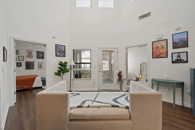 a living room with furniture and a couch