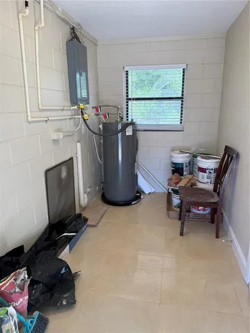 a room with furniture and a window