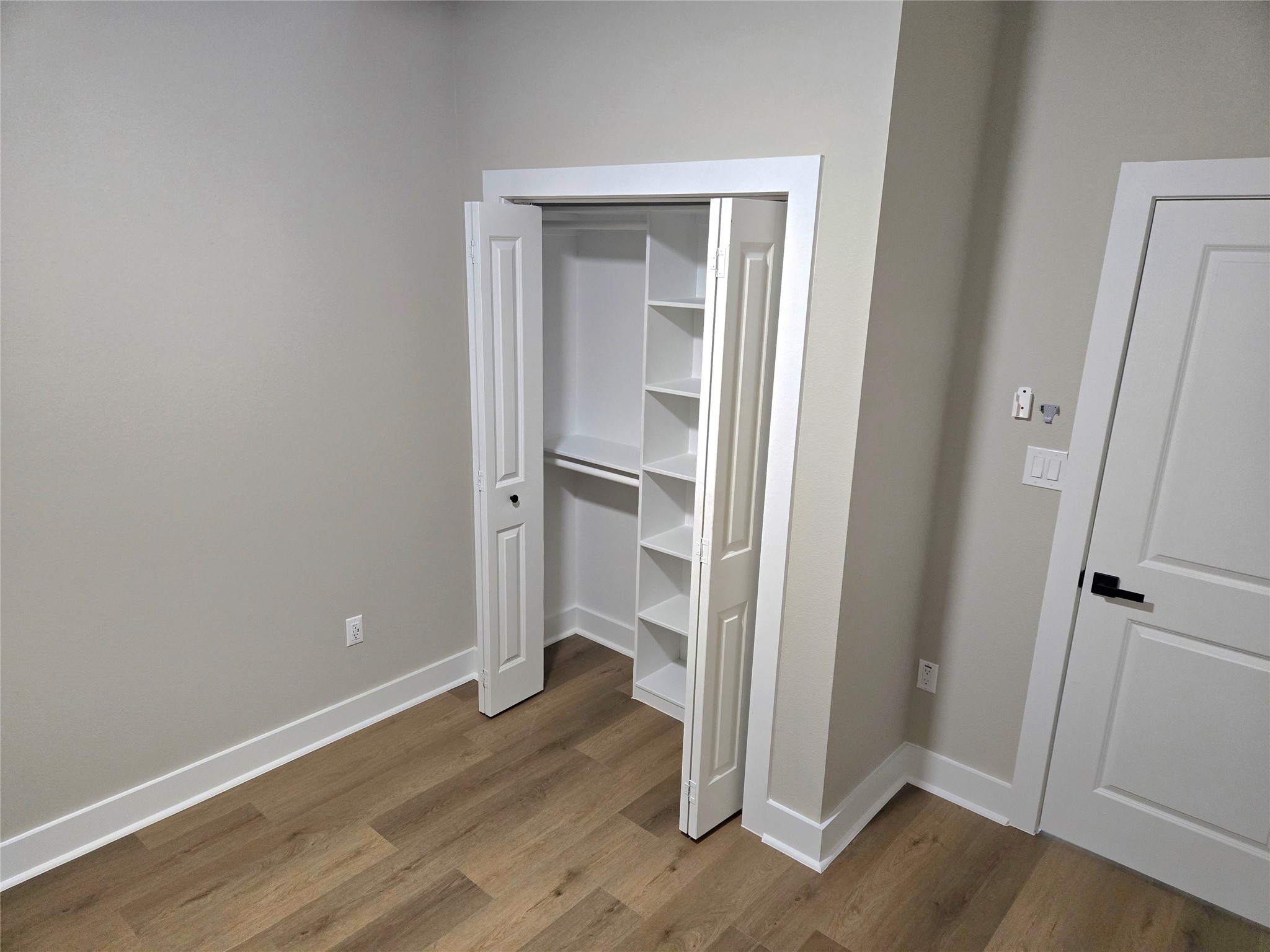 7830 Woodlyn Road, Unit B Houston, TX 77028 - Photo 6 of 10 Closet with built-in shelving and hanging space