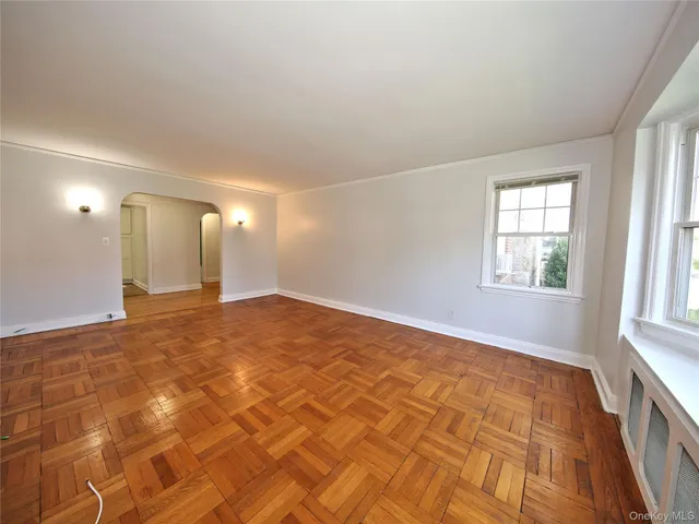 a view of a livingroom with furniture and a rug