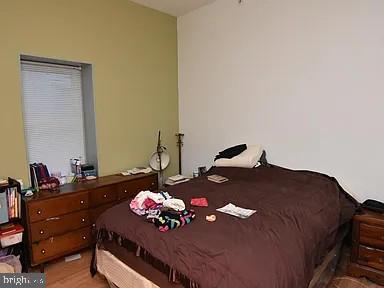 118 South 46th Street Philadelphia, PA 19139 - Photo 5 of 7 a bedroom with a bed and dresser