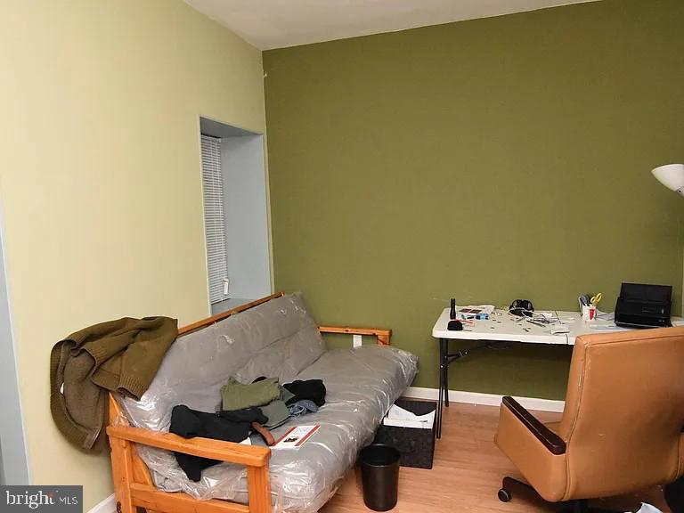 118 South 46th Street Philadelphia, PA 19139 - Photo 6 of 7 a bed room with a bed and a chair