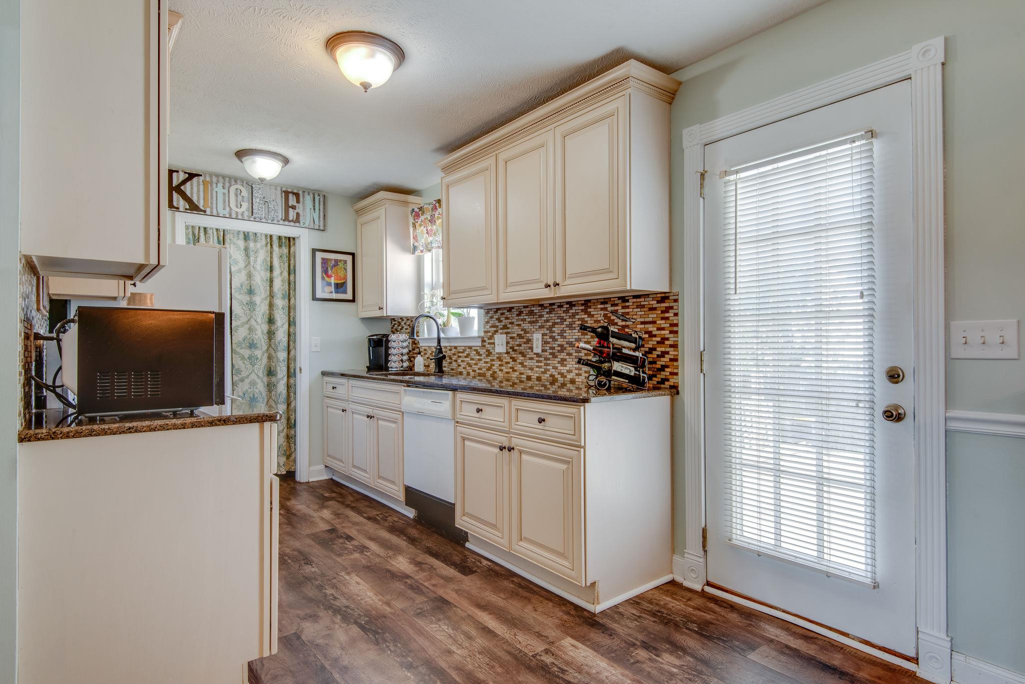 4475 Blackman Road Murfreesboro, TN 37129 - Photo 7 of 15 KITCHEN WITH GRANITE AND UPDATED CABINETS.