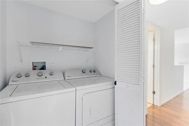 a utility room with dryer and washer