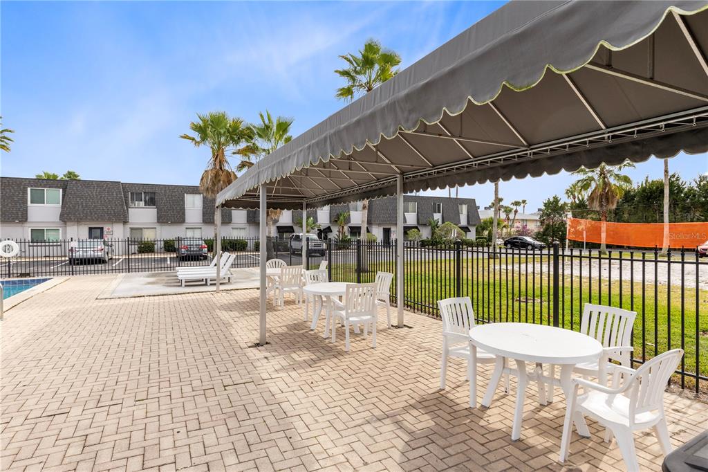 1938 South Conway Road, Unit 5 Orlando, FL 32812 - Photo 17 of 21 a patio view with a seating space