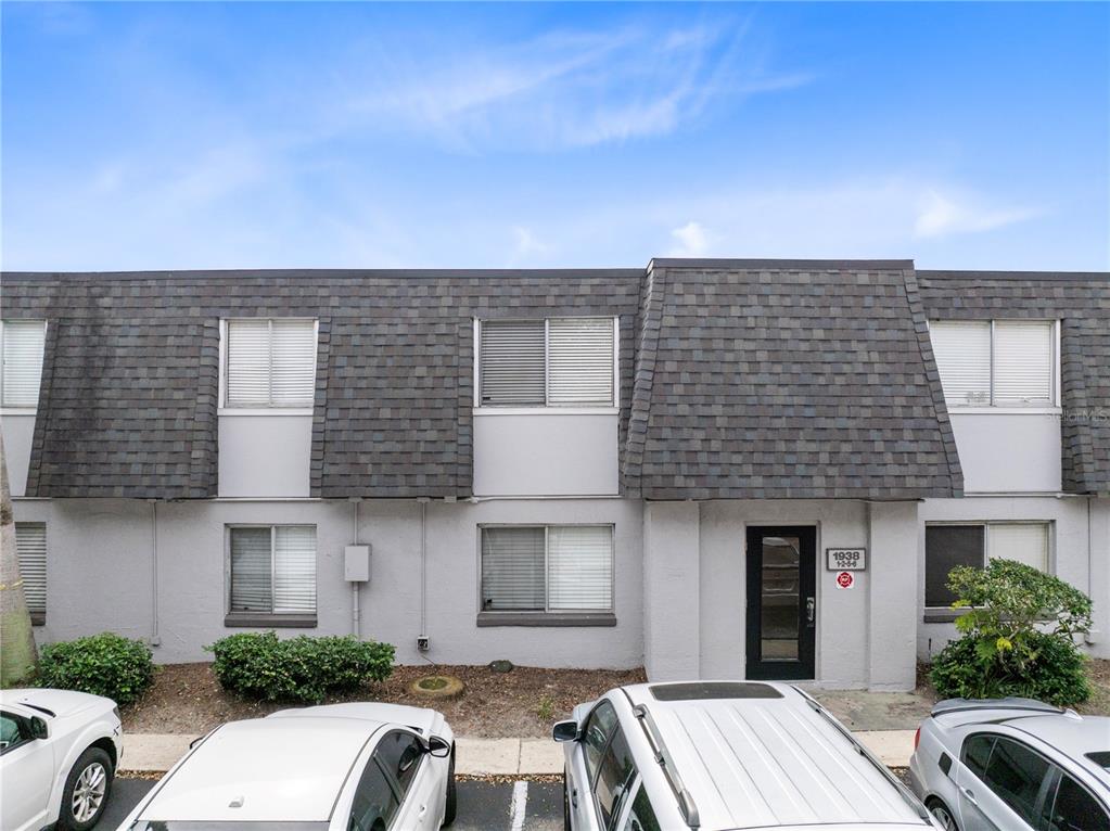 1938 South Conway Road, Unit 5 Orlando, FL 32812 - Photo 21 of 21 a front view of a house with a yard