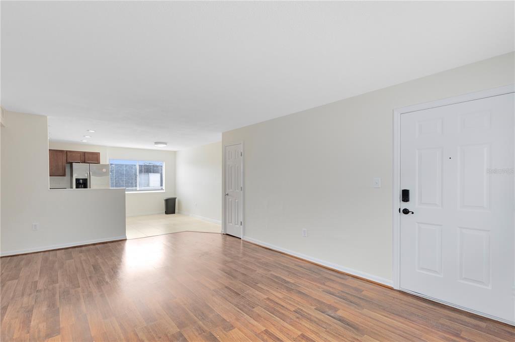 1938 South Conway Road, Unit 5 Orlando, FL 32812 - Photo 3 of 21 a view of a room with wooden floor and window
