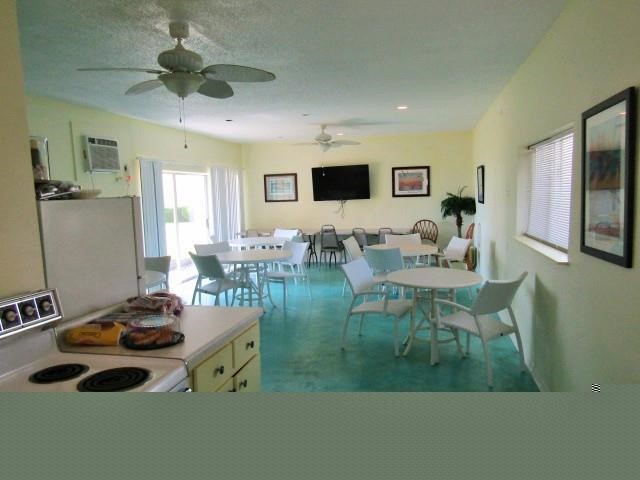 2003 North Fulton Beach Road, Unit 34 34 Rockport, TX 78382 - Photo 27 of 38 a living room with furniture and a flat screen tv
