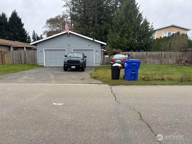 426 105th Street Southwest Everett, WA 98204 - Photo 1 of 1 a view of a house with backyard and trees