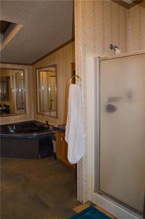 2401 Hudson Road Hudson, ME 04449 - Photo 11 of 26 Master bath has jetted tub and...