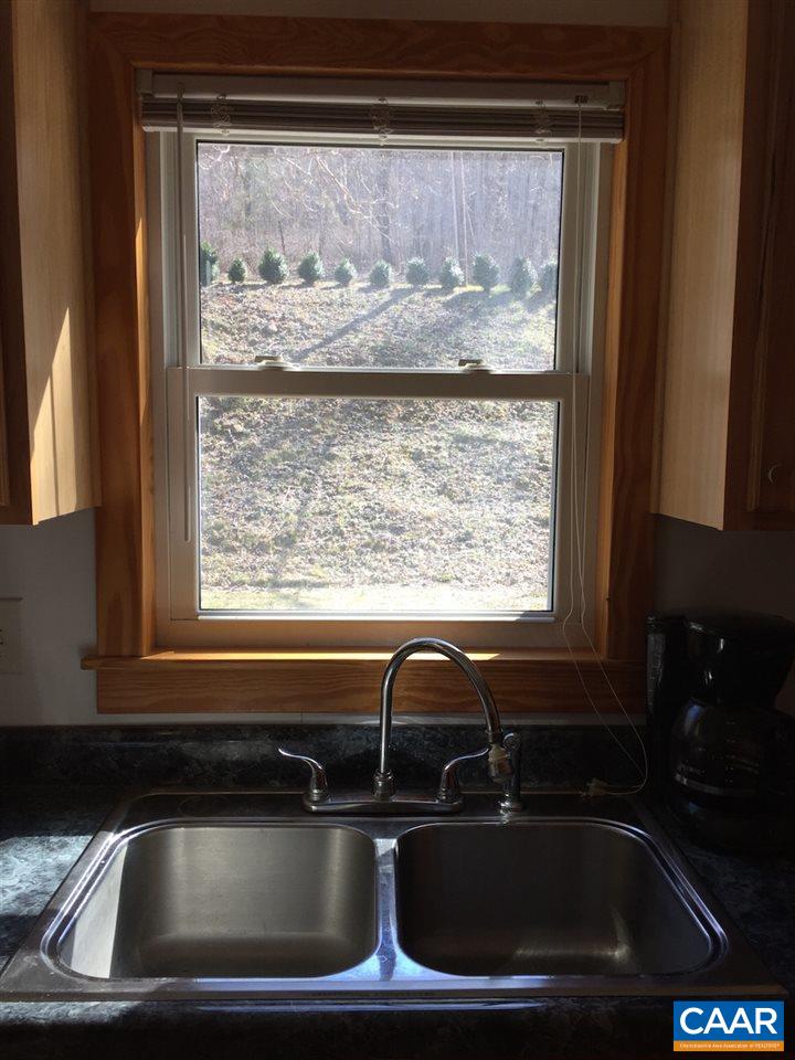1987 Arrowhead Valley Road Charlottesville, VA 22903 - Photo 7 of 23 a close view of sink and microwave