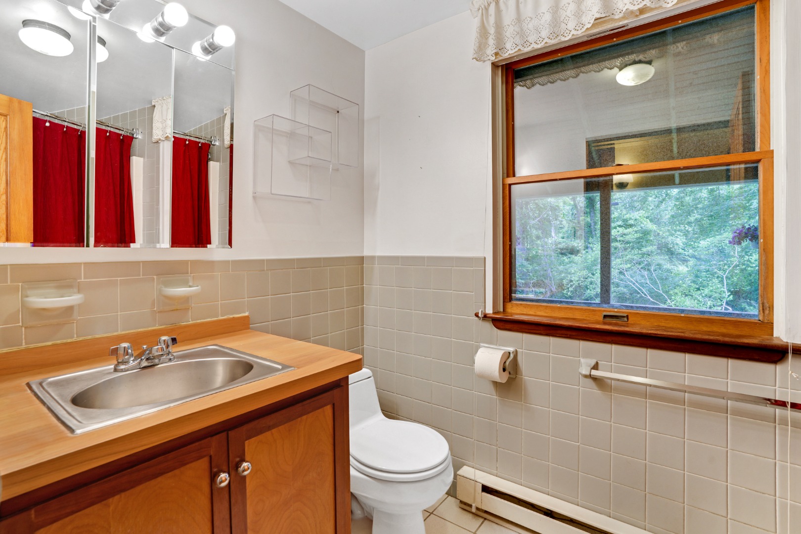 174 Middle Road Chilmark, MA 02535 - Photo 19 of 40 a bathroom with a sink and a toilet