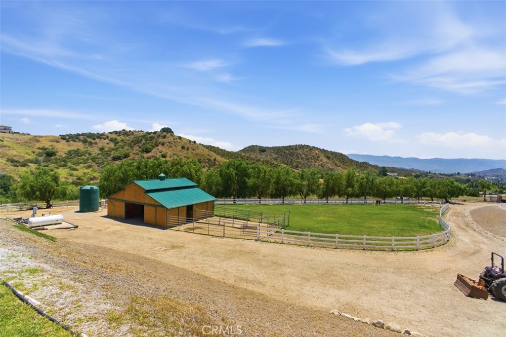 31233 Romero Canyon Road Castaic, CA 91384 - Photo 4 of 38 a view of an outdoor space and a yard