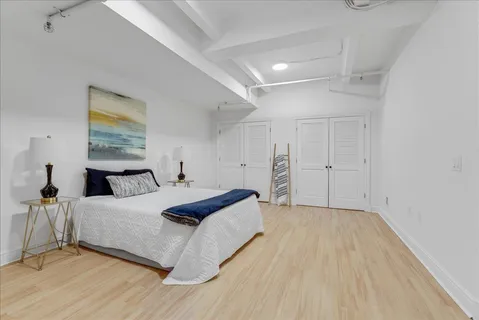 a view of livingroom with furniture and hardwood floor