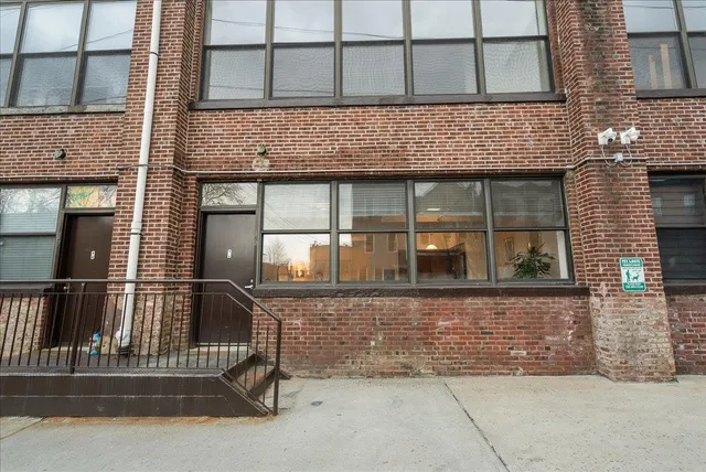 front view of a house with a small yard