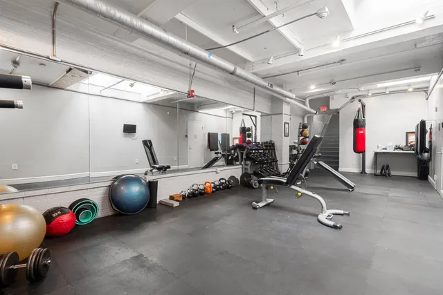 a view of a room with gym equipment
