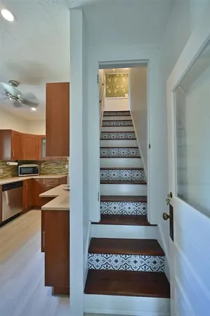 a view of a living room and entry way