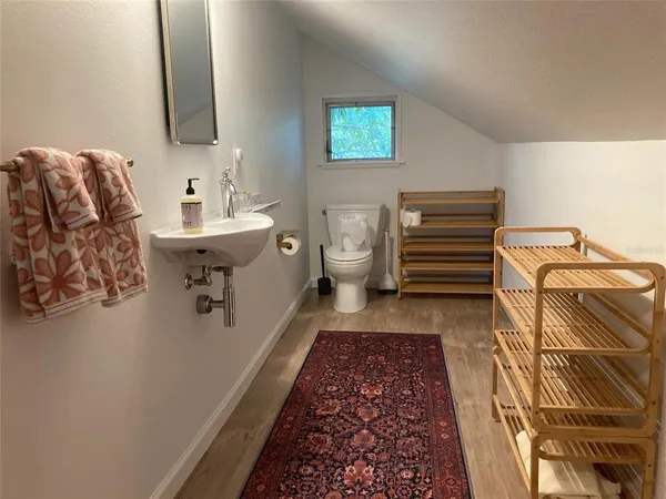 a bathroom with a sink and mirror