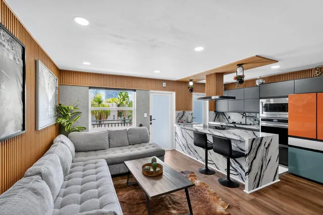 a living room with furniture and a table