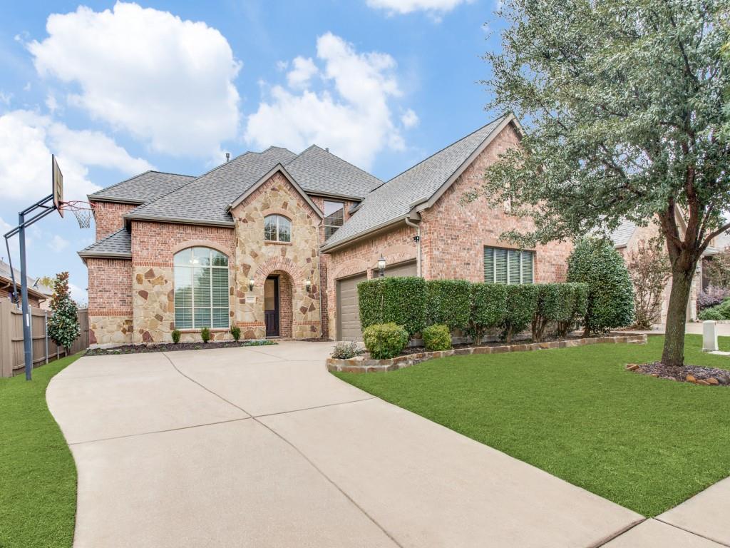 9609 Sam Bass Trail Fort Worth, TX 76244 - Photo 1 of 25 a front view of a house with a yard