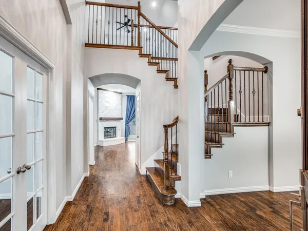 a view of entryway with wooden floor