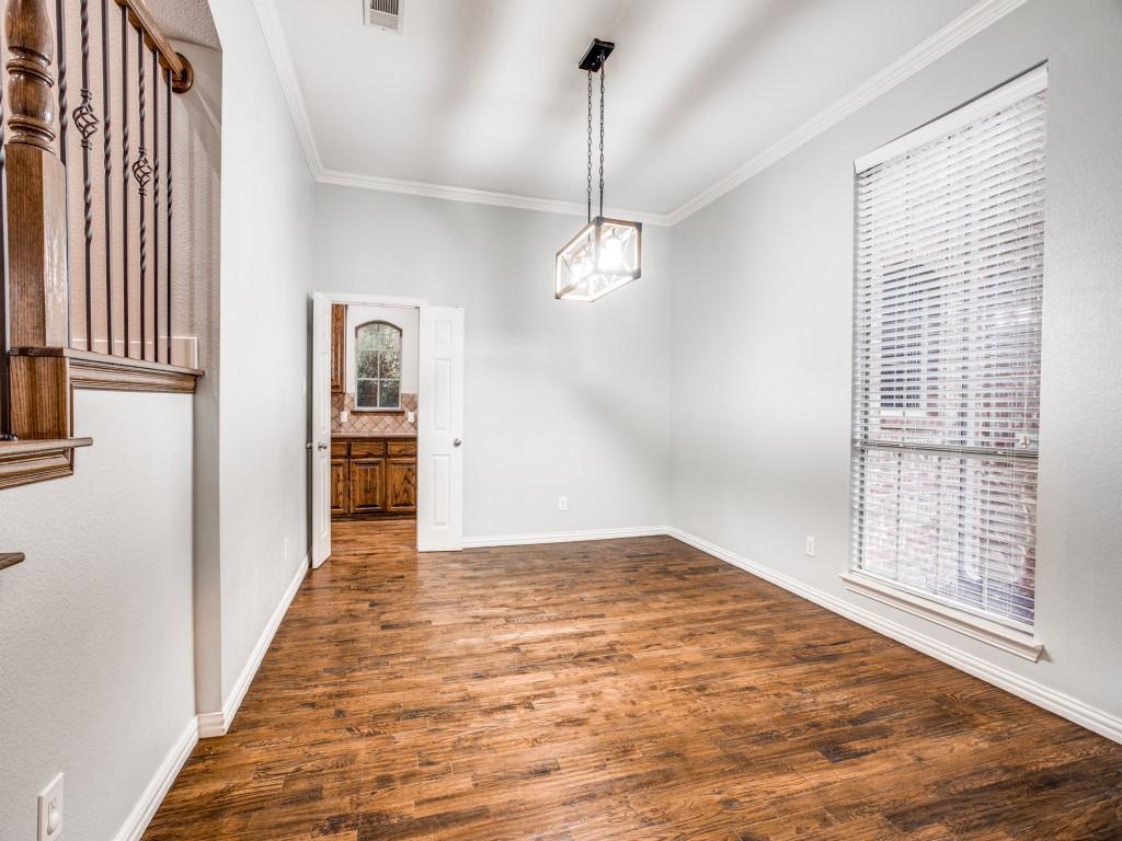 9609 Sam Bass Trail Fort Worth, TX 76244 - Photo 7 of 25 a view of an empty room with a window
