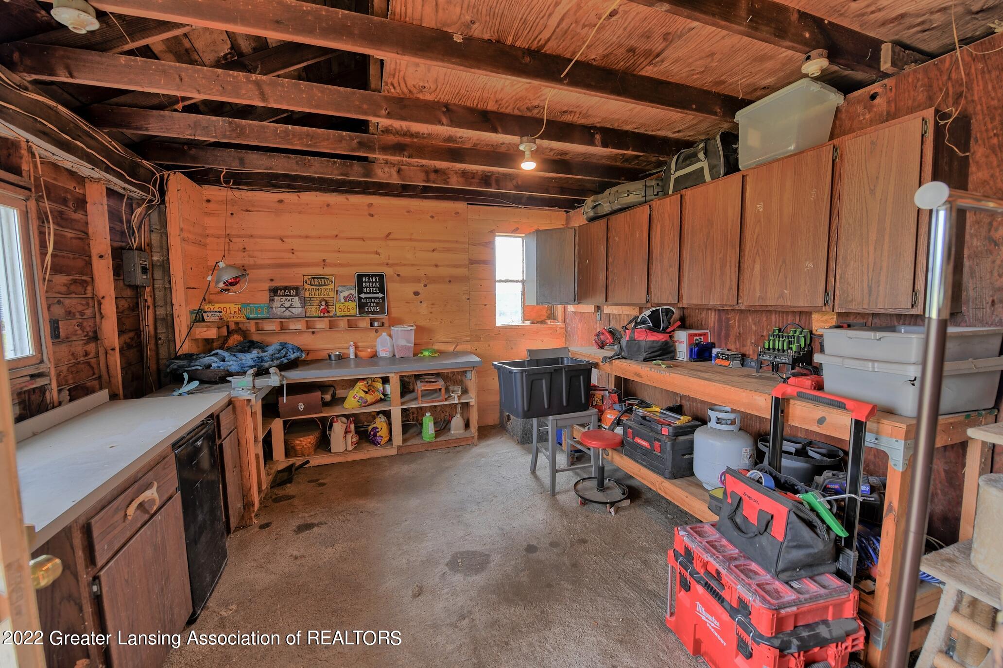 10909 Looking Glass Road Portland, MI 48875 - Photo 22 of 36 Garage workshop