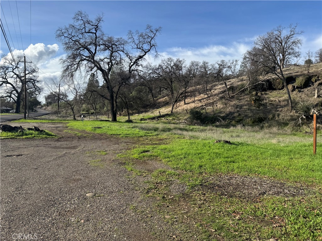 1045 Honey Run Road Chico, CA 95928 - Photo 14 of 19 a view of outdoor space with deck and yard