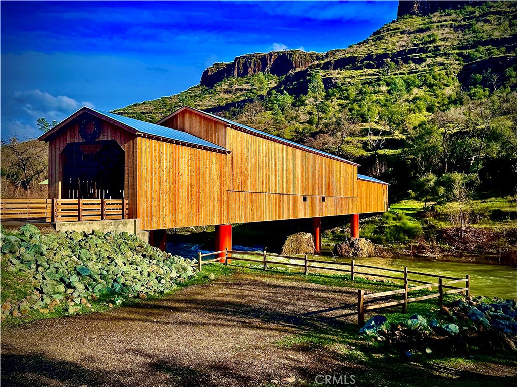 1045 Honey Run Road Chico, CA 95928 - Photo 2 of 19 a front view of a house with a yard