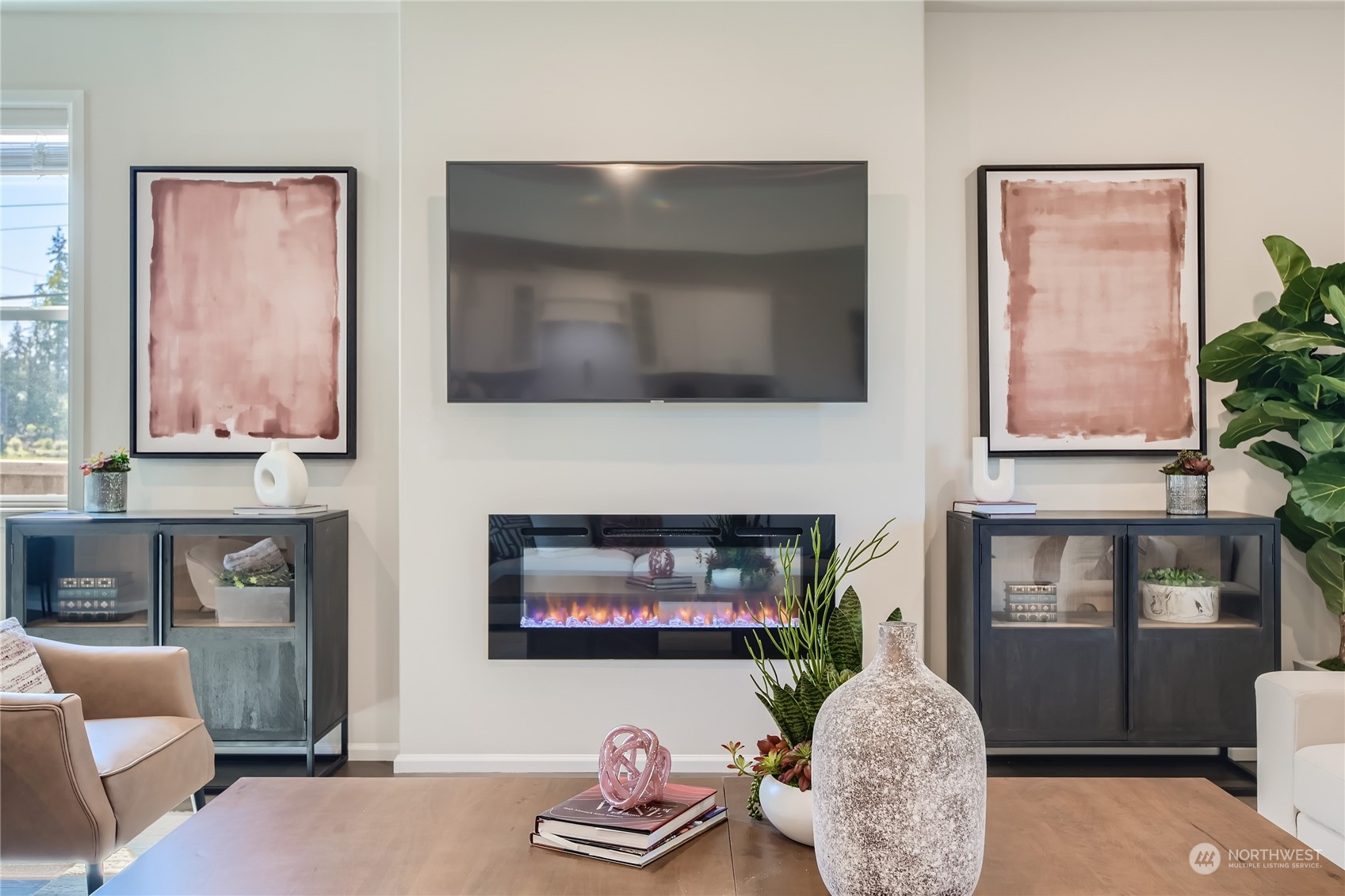 20809 42nd Avenue Southeast, Unit 202 Bothell, WA 98021 - Photo 25 of 33 a living room with furniture and a fireplace