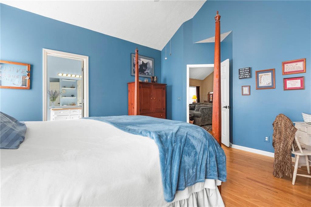 826 Hampton Way Canton, GA 30115 - Photo 12 of 17 a bedroom with a bed and a dresser