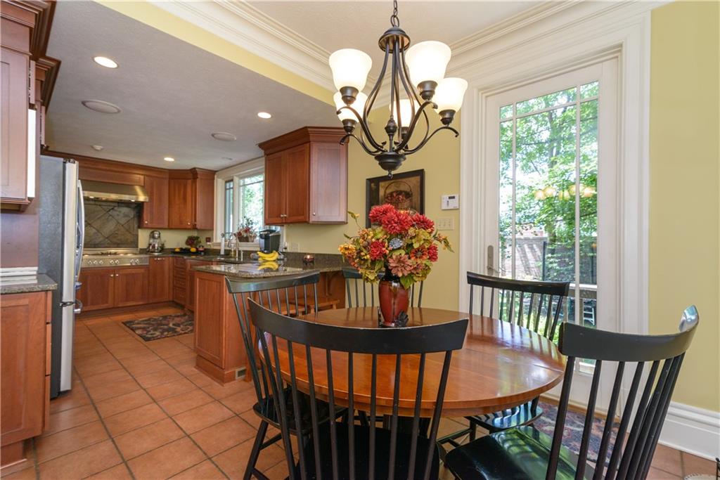 403 Quaker Road Sewickley, PA 15143 - Photo 11 of 24 a view of a dining room with furniture window and outside view
