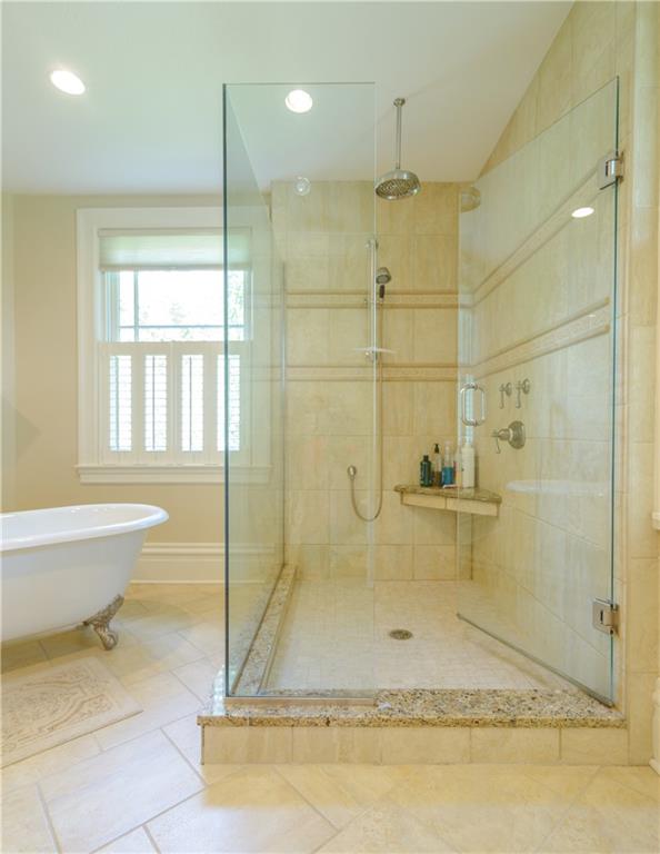403 Quaker Road Sewickley, PA 15143 - Photo 16 of 24 a bathroom with a granite countertop sink a toilet and shower