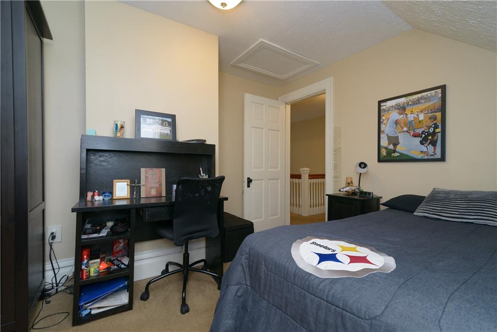 403 Quaker Road Sewickley, PA 15143 - Photo 22 of 24 a living room with furniture and a fireplace